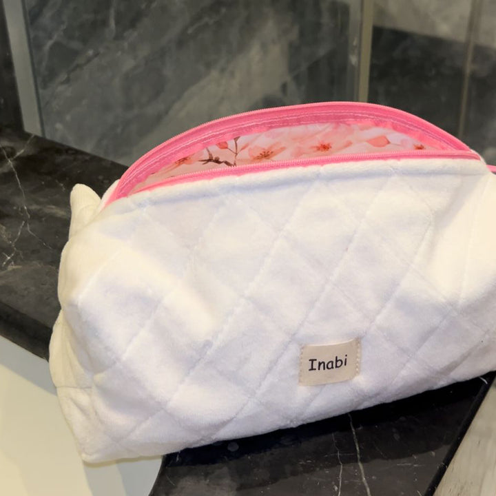 Ivory Bloom  Trousse blanche / écru – Jersey velours légèrement texturé